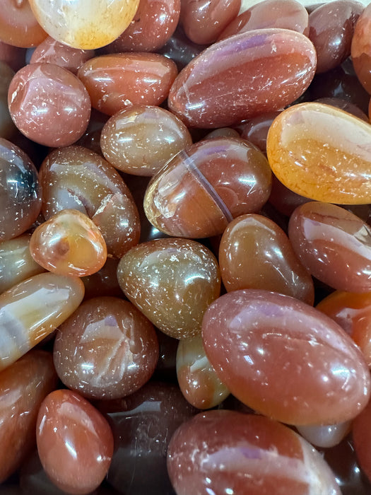 Showing the variety of crystals in the I Am Enough crystal kit, including Smoky Citrine and Sodalite.