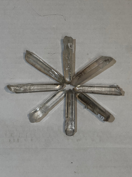 Syrian Lemurian Starberry Crystals showcasing their unique striations, star-like inclusions, and stunning colors, perfect for starseed energy healing crystals enthusiasts.