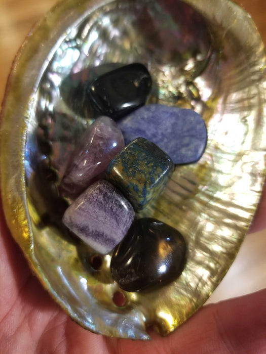 Spiritual Crystal Kit featuring Smoky Quartz, Charoite, Black Tourmaline, Sodalite, and Fluorite included in the Mercury Retrograde kit for grounding and reflection.