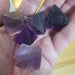 Fluorite Octahedrons Purple crystal showcasing a dark purple color, unpolished and cube-shaped for healing and spiritual harmony.