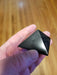 Shungite - Pyramid with a description of its electromagnetic field reduction properties.