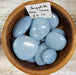 Stunning light blue Angelite Palm stones by High Ho Gems and Crystals, perfect for calming and enhancing communication.