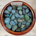 Beautiful Azurite Tumbled stones showcasing vibrant blue colors, perfect for collectors and healing crystal enthusiasts.