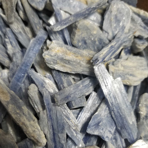 Blue Kayanite raw stone showcasing its stunning indigo color, perfect for enhancing mind and body harmony.