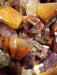 Collection of Cacoxenite Amethyst Tumbled stones, radiating light and energy with protective properties.