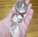 High Ho Gems and Crystals Clear Quartz palm stone, a master healer that amplifies energy and intentions.
