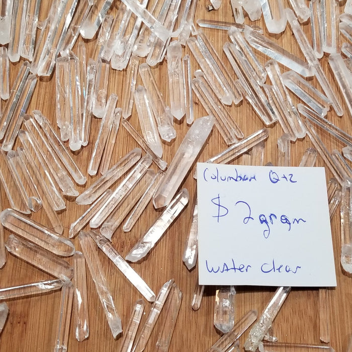 Columbian Quartz Pencil showcasing clear water-like clarity, perfect for healing and decoration.