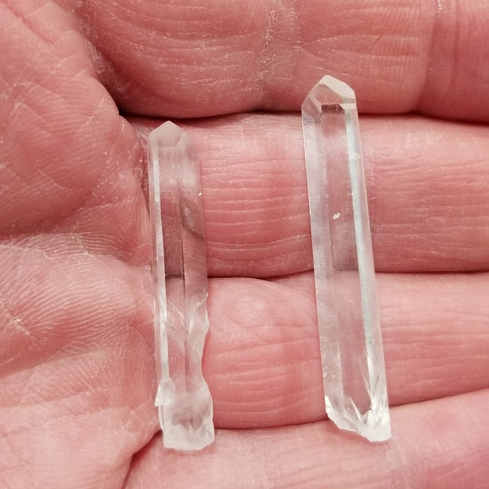 Stunning Columbian Quartz Pencil displayed against a neutral background, illustrating its elegant form and quality.