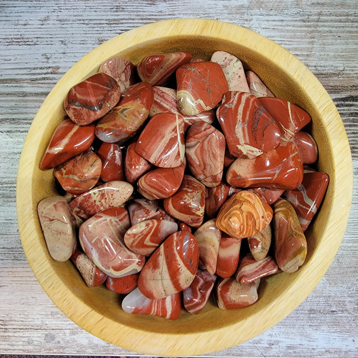Beautiful Flower Jasper Tumbled stone showcasing natural swirls of cream, brown, gold, gray, pink, and burgundy colors.