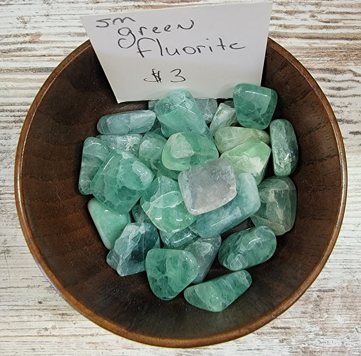 Tumbled stones - Fluorite Green (Small) tumbled stones showcasing vibrant green colors, perfect for enhancing focus and absorbing negative energy.