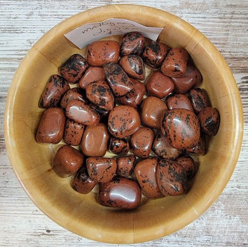 Mahogany Obsidian tumbled stones showcasing rich mahogany colors, perfect for crystal healing and aura strengthening.