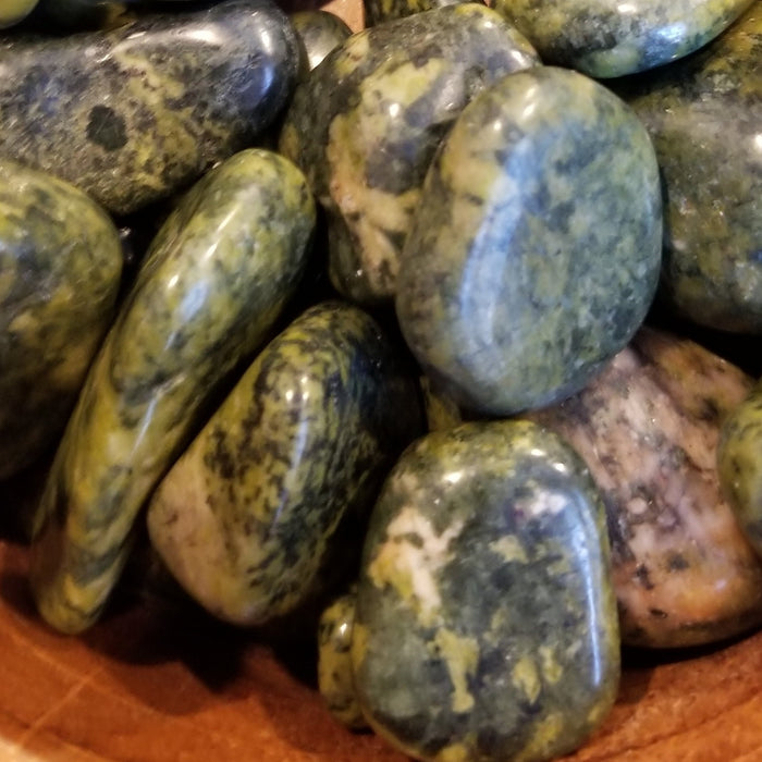 Tumbled Stones - Nephrite Jade Tumbled pieces showcasing beautiful green colors ideal for lucid dreaming and nurturing energy.