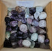 Beautiful Fluorite (Rainbow) tumbled stones from China, showcasing vibrant colors and unique patterns, perfect for healing and decorative purposes.