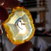 Artistic arrangement of multiple Rainbow Iris Agate Slices exhibiting a range of lively colors and textures.