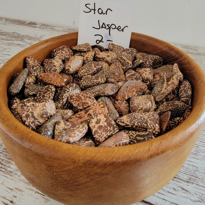 Star Jasper tumbled stones showcasing their unique color variations, perfect for crystal healing and decoration.