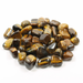The Earth Star Chakra Crystal kit includes Tiger's Eye, Unakite, Smoky Quartz, and Obsidian for enhancing chakra healing.