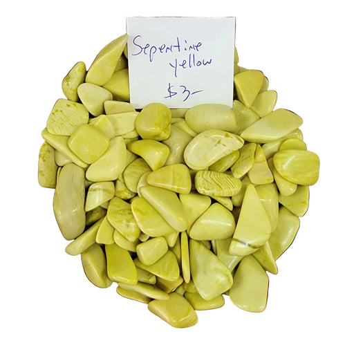 Serpentine Yellow Tumbled stone, showcasing its vibrant yellow color and natural beauty, known for enhancing meditative states and emotional balance.
