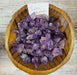 High-quality Bahai Amethyst tumbled stone showcasing its dark purple saturation from Brazil, perfect for healing and decoration.