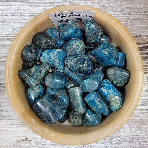 High-quality Blue Apatite Tumbled stone, showcasing its vibrant blue color, perfect for spiritual cleansing and enhancing communication.