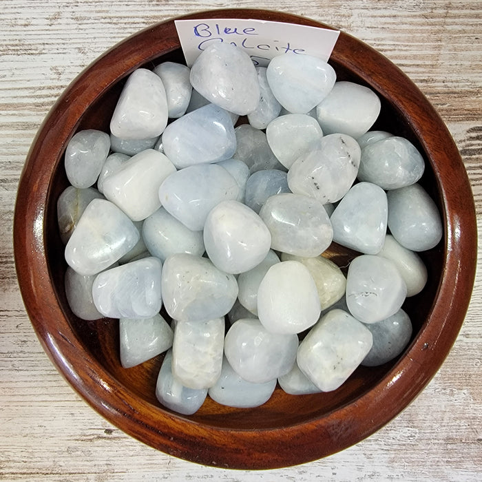 High-quality Blue Calcite stone, showcasing its beautiful bluish-gray color and unique texture, ideal for crystal collectors and healing enthusiasts.