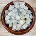 High-quality Blue Calcite stone, showcasing its beautiful bluish-gray color and unique texture, ideal for crystal collectors and healing enthusiasts.