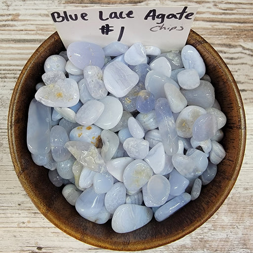 Tumbled stones - Blue Lace Agate - Chips showcasing their light blue and white hues, perfect for enhancing communication and promoting calmness.