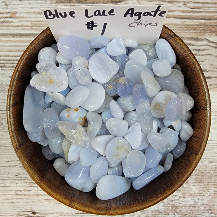Tumbled stones - Blue Lace Agate - Chips showcasing their light blue and white hues, perfect for enhancing communication and promoting calmness.