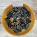 Blue Tigers Eye Tumbled stones showcasing their vibrant blue color and unique chatoyancy effects, perfect for meditation and promoting focus.