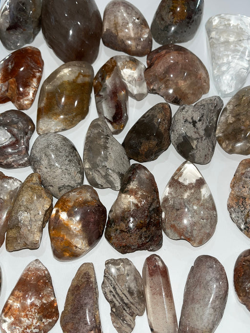 Close-up of Lodolite Quartz Lenses, also known as Shaman Quartz or garden quartz, highlighting its unique lens shape.