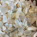 High quality White Moonstone Chips from High Ho Gems and Crystals, showcasing their natural white color and small chip size, perfect for crafting or crystal healing.