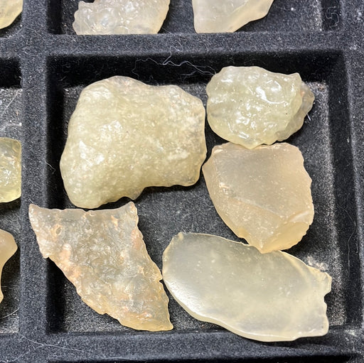 Close-up view of Tektite - Libyan Desert Glass highlighting its stunning texture and color, ideal for chakra balancing and healing practices.