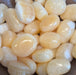 Beautiful Orange Calcite tumbled stones from Pakistan, perfect for crystal healing and decor.