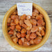 Tumbled stones in vibrant orangish peach color, featuring Peach Quartz Tumbled from High Ho Gems and Crystals, promoting joy, forgiveness, and community connection.