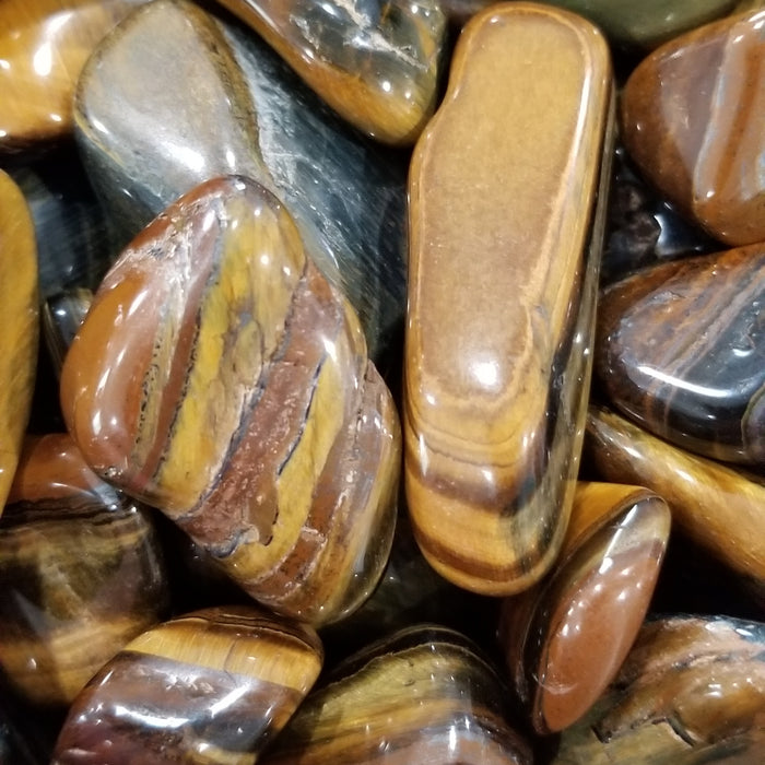 High-quality Yellow Jasper Tumbled stone showcasing its vibrant yellow color ideal for crystal enthusiasts and collectors.